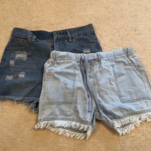 Two Amazon denim shorts.  Run true to size. Size s.